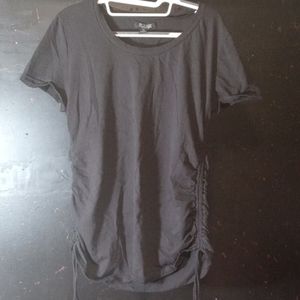 Black top with bunched up sides